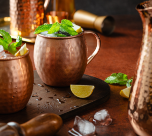 moscow mule copper mugs on table